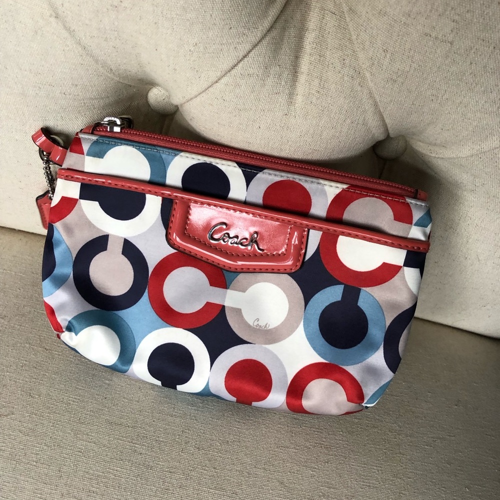Coach peach wristlet
